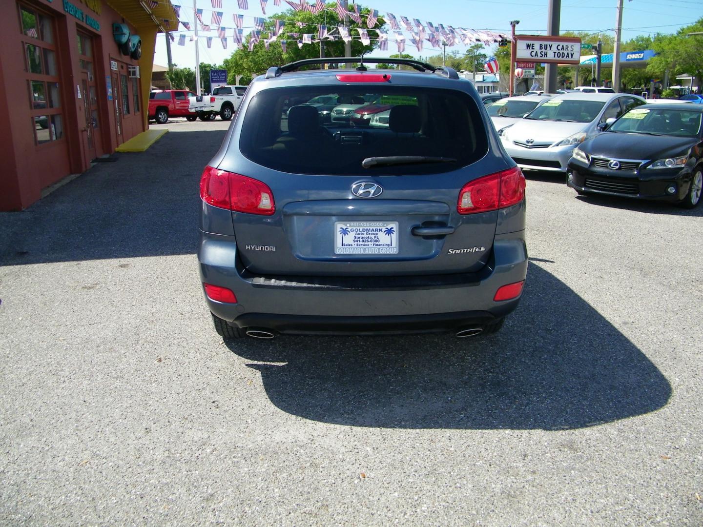 2007 Gray /Gray Hyundai Santa Fe GLS (5NMSG13D57H) with an 2.7L V6 DOHC 24V engine, Automatic transmission, located at 4000 Bee Ridge Road, Sarasota, FL, 34233, (941) 926-0300, 27.298664, -82.489151 - Photo#4